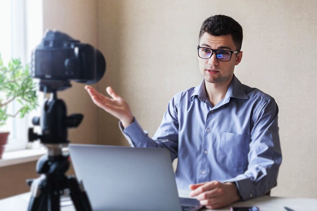 young-man-conducting-a-webinar-2022-12-16-12-33-40-utc-1 - Real-Estate-Leads Hosting Webinars for First-Time Homebuyers: Education and Lead Generation