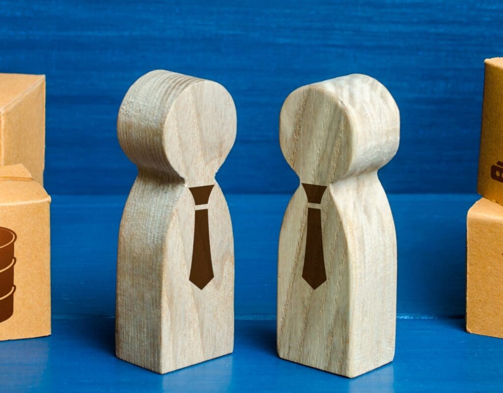 people-figures-conducting-business-negotiations-an-2022-11-09-06-33-34-utc - Real-Estate-Leads How to Overcome Sales Objections in Real Estate: Negotiation