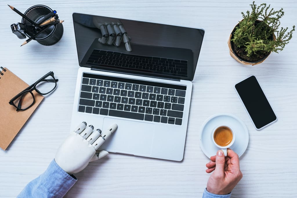 cropped-image-of-businessman-with-prosthetic-arm-u-2023-11-27-05-32-29-utc - Real-Estate-Leads Managing Rental Properties: Expert Tips for Real Estate Agents: Utilize Technology and Tools